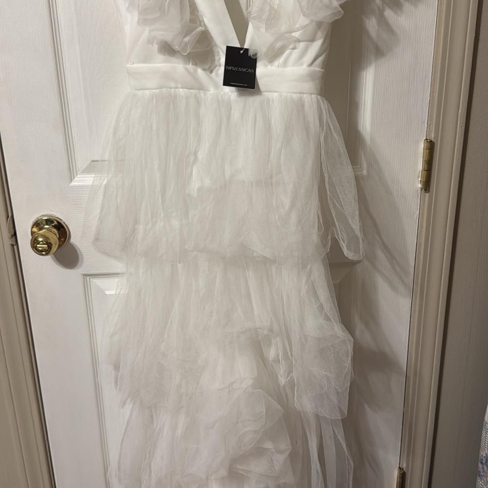 White Ruffled Evening Gown